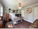 Office space with hardwood floors, shelves, a desk, and vintage decor at 4823 Antioch Church Rd, Weddington, NC 28104