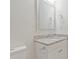 Bright bathroom with granite countertop, modern sink, and matching fixtures at 507 E Green St, Monroe, NC 28112