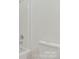 Clean bathroom features shower-tub combo, neutral walls, and modern toilet at 507 E Green St, Monroe, NC 28112