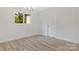 Cozy bedroom featuring modern flooring, fresh paint, and a bright window at 507 E Green St, Monroe, NC 28112