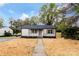 Charming home featuring a well-manicured lawn, and a welcoming front porch at 507 E Green St, Monroe, NC 28112