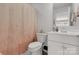 Well-lit bathroom featuring a white vanity, toilet, and a shower with a stylish curtain at 5119 Moselle Ave, Fort Mill, SC 29707