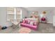 Adorable bedroom with a cozy sitting area and playful decor at 5119 Moselle Ave, Fort Mill, SC 29707