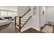 Inviting entryway with beautiful hardwood floors, staircase, and neutral decor at 5119 Moselle Ave, Fort Mill, SC 29707