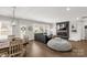 Comfortable living room featuring a fireplace, large windows, and modern decor at 5119 Moselle Ave, Fort Mill, SC 29707