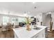 Bright living space with an open concept, connecting dining, living, and kitchen at 5119 Moselle Ave, Fort Mill, SC 29707