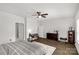 Spacious main bedroom with hardwood floors, ceiling fan, and neutral decor at 5119 Moselle Ave, Fort Mill, SC 29707