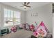 A playroom with carpet flooring, and bright natural light at 5119 Moselle Ave, Fort Mill, SC 29707