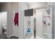 Modern bathroom featuring a glass-enclosed shower with built-in shelving and accessories at 530 Kiser Ln, Locust, NC 28097