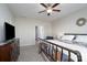 Spacious bedroom with ceiling fan and furniture at 530 Kiser Ln, Locust, NC 28097