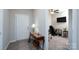 Inviting entryway with a wooden console table and access to a home office at 530 Kiser Ln, Locust, NC 28097