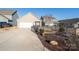 Spacious two-car garage with long driveway, fenced-in yard, and easy access to the home at 530 Kiser Ln, Locust, NC 28097