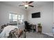 Comfortable home office space with a large window and a ceiling fan at 530 Kiser Ln, Locust, NC 28097