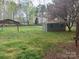 Backyard with gazebo, shed and blooming tree at 5319 Springdale Ave, Mint Hill, NC 28227