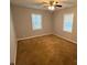 Neutral bedroom features carpet flooring and natural light from multiple windows at 5319 Springdale Ave, Mint Hill, NC 28227
