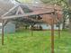 Backyard of home featuring a wooden gazebo structure with light fixtures at 5319 Springdale Ave, Mint Hill, NC 28227