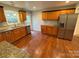 Kitchen featuring granite countertops, stainless steel appliances, and plenty of cabinet space at 5319 Springdale Ave, Mint Hill, NC 28227