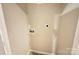 A look at the unfinished laundry room with washer/dryer hookups at 5319 Springdale Ave, Mint Hill, NC 28227