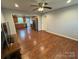 Open-concept living room showcasing hardwood floors at 5319 Springdale Ave, Mint Hill, NC 28227