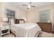 Comfortable bedroom with neutral decor, soft lighting, and a patterned floor, creating a serene retreat at 5329 Glenbrier Dr, Charlotte, NC 28212