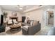 Cozy living room with a fireplace, comfortable seating, and neutral tones at 5329 Glenbrier Dr, Charlotte, NC 28212