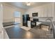 Modern kitchen with white cabinets, black countertops, and stainless steel appliances for a sleek look at 5430 Dockery Dr, Charlotte, NC 28209