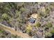 Overhead view displaying the house surrounded by lush trees, showing its secluded and private setting at 676 Chapel Hill Dr, Troy, NC 27371