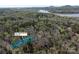 Aerial view of 676 Chapel Hill Dr, Troy, NC property with a blue boundary line at 676 Chapel Hill Dr, Troy, NC 27371