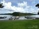 Community docks on the lake offer boating access with scenic mountain views at 676 Chapel Hill Dr, Troy, NC 27371