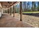 Covered porch with wood columns providing an outdoor living space at 676 Chapel Hill Dr, Troy, NC 27371