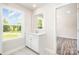 Charming bathroom with a classic vanity, bright window, and modern fixtures for a comfortable experience at 7001 New Town Rd, Waxhaw, NC 28173