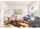 Bright home office with hardwood floors, comfortable seating, and plenty of natural light at 7001 New Town Rd, Waxhaw, NC 28173