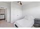 Bedroom featuring a closet, ceiling fan, and cozy design at 7957 Reunion Row Dr, Charlotte, NC 28277