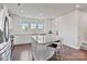 Beautiful kitchen featuring granite countertops, stainless steel appliances, and a breakfast bar with seating at 7957 Reunion Row Dr, Charlotte, NC 28277