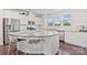 Modern kitchen boasting granite countertops, stainless steel appliances, and a convenient breakfast bar at 7957 Reunion Row Dr, Charlotte, NC 28277