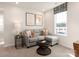 Cozy living room with a comfortable gray sofa, decorative pillows, and a stylish coffee table at 811 Blue Canyon Dr, York, SC 29745