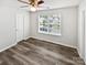 Bedroom featuring natural light from the window, complemented by modern wood-look flooring at 1082 Wallace Lake Rd, Fort Mill, SC 29707