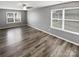 Bedroom filled with natural light, complemented by modern wood-look flooring at 1082 Wallace Lake Rd, Fort Mill, SC 29707
