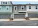 View of the garages for a set of modern townhomes at 1112 Drummond Ave, Charlotte, NC 28205