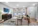 Spacious living room showcasing comfortable seating, elegant decor, and plenty of natural light at 1112 Drummond Ave, Charlotte, NC 28205