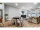 Open-concept living and dining area featuring modern furnishings and ample natural light at 1112 Drummond Ave, Charlotte, NC 28205