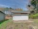 Exterior view of detached garage with metal roof, white painted siding, and lawn at 1209 Mount Ulla Hwy, Mooresville, NC 28115
