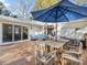 Inviting back deck with outdoor furniture, perfect for relaxing and entertaining guests outdoors at 1210 Sewickley Dr, Charlotte, NC 28209