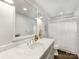 This bathroom features a marble countertop and updated fixtures at 1210 Sewickley Dr, Charlotte, NC 28209