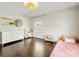 This cozy bedroom offers hardwood floors and great natural light at 1210 Sewickley Dr, Charlotte, NC 28209