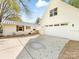 Well-maintained garage and driveway showcasing the home's exterior and ample parking space at 1210 Sewickley Dr, Charlotte, NC 28209