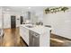 Spacious kitchen featuring island with seating and stainless steel dishwasher at 1210 Sewickley Dr, Charlotte, NC 28209