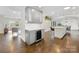 Kitchen featuring island with seating and stainless steel wine cooler at 1210 Sewickley Dr, Charlotte, NC 28209