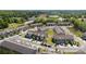 Aerial view of a neighborhood featuring well-maintained homes, green spaces, and winding roads at 1212 Croft Dr, Fort Mill, SC 29708