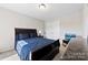 Comfortable bedroom featuring a queen-sized bed, soft lighting, and a relaxing atmosphere at 1212 Croft Dr, Fort Mill, SC 29708